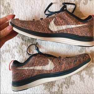 Women’s Nike Flyknit Sneakers (Coral)